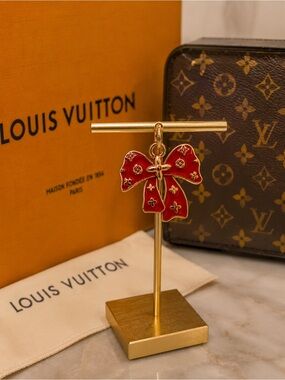 Louis Vuitton stamped Red Enamel Bow Charm with Gold Hardware